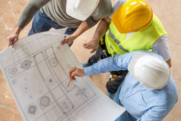 civil-engineers-looking-at-blueprints-473683922-5c14287446e0fb00014ad74b civil-engineers-looking-at-blueprints-473683922-5c14287446e0fb00014ad74b
